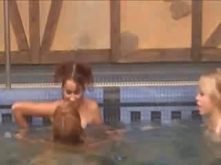 Beguiling lezzies in the swimming pool